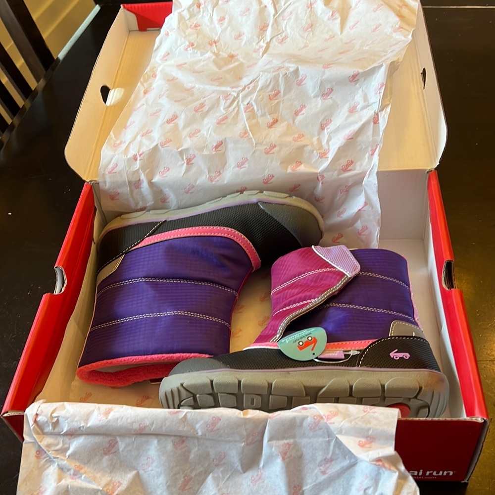 See Kai run snow boots.  New in box! Size 2.